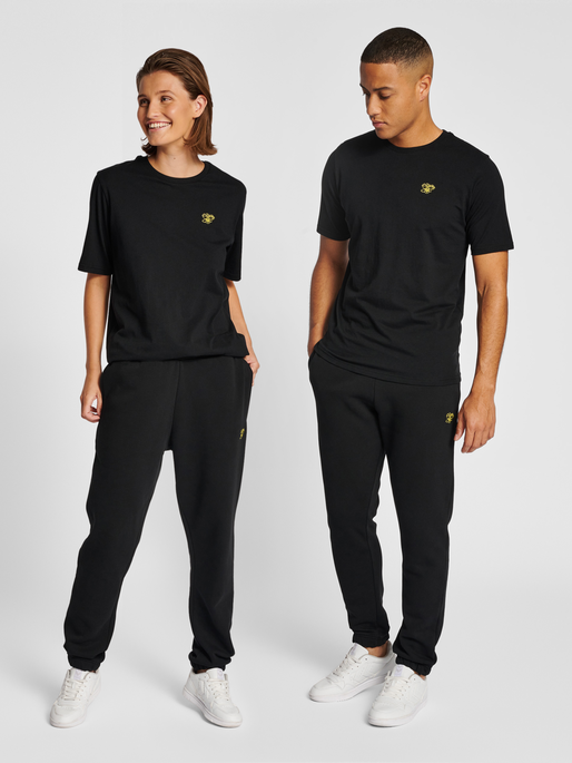 SWEATPANTS BLACK hummel AMNESTY -