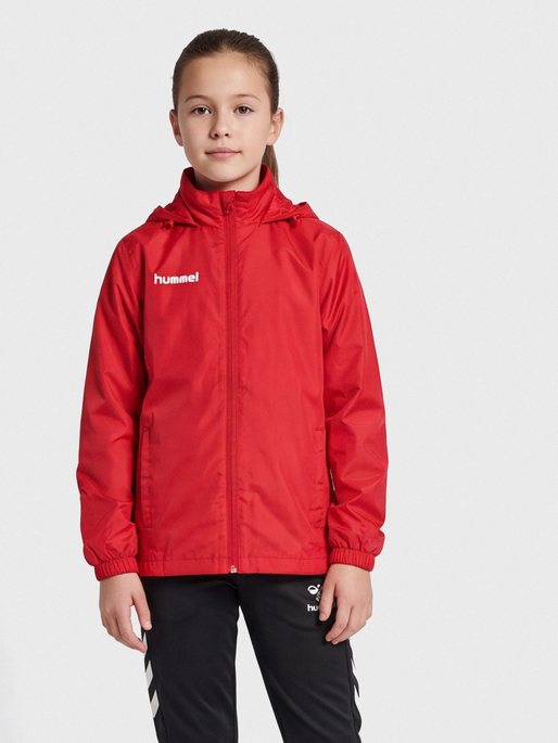 hmlPROMO RAIN JACKET KIDS, TRUE RED, model