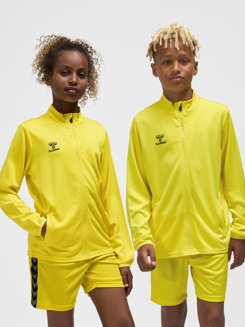 hummel ESSENTIAL TRACK JACKET KIDS BLAZING YELLOW hummel