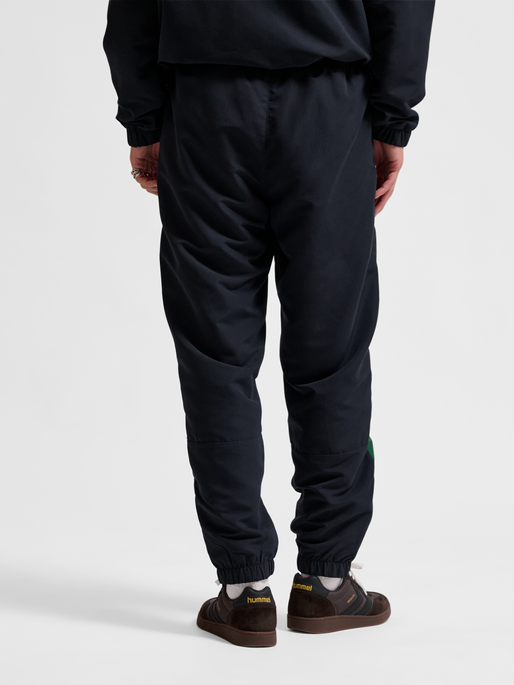 hmlTRACKSUIT PANTS SPORTSWEAR, BLACK, model