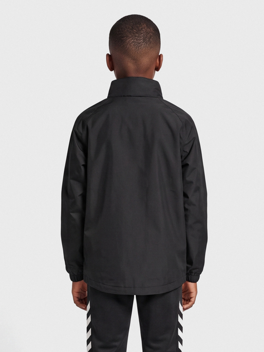 hmlPROMO RAIN JACKET KIDS, BLACK, model