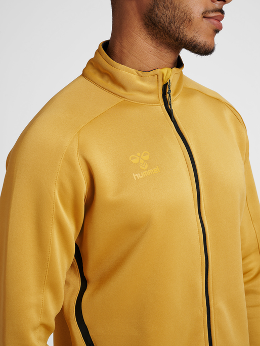 hmlCIMA XK ZIP JACKET, ANTIQUE GOLD, model