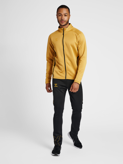 hmlCIMA XK ZIP JACKET, ANTIQUE GOLD, model
