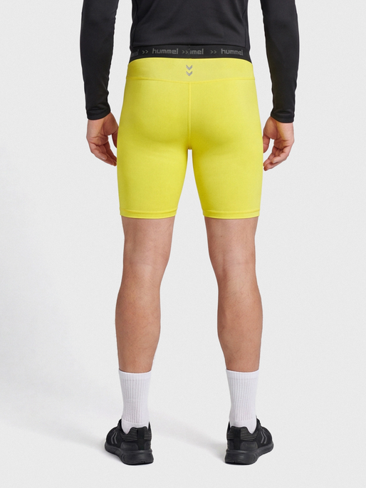 HML FIRST PERFORMANCE TIGHT SHORTS, BLAZING YELLOW, model
