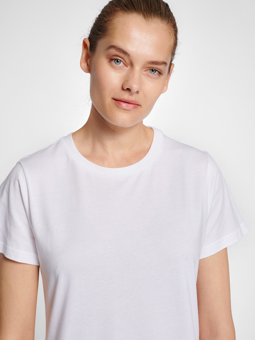 Woman in white deals t shirt