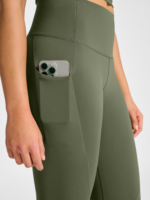 hmlHIIT INTENSITY HIGH WAIST TIGHTS, DEEP LICHEN GREEN, model