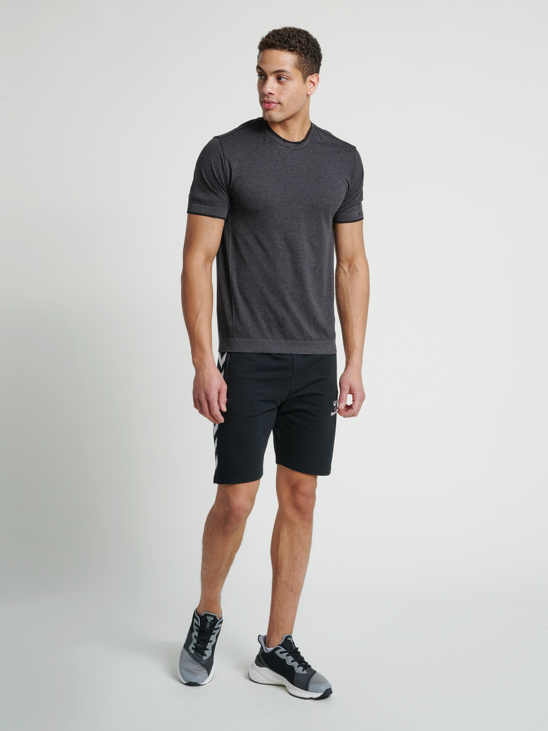 black t shirt and shorts