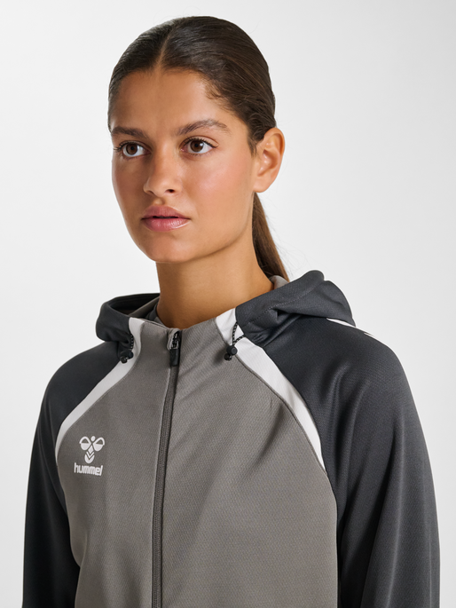 hmlLEAD 2.0 ZIP HOODIE WOMAN, STEEL GRAY/ASPHALT, model