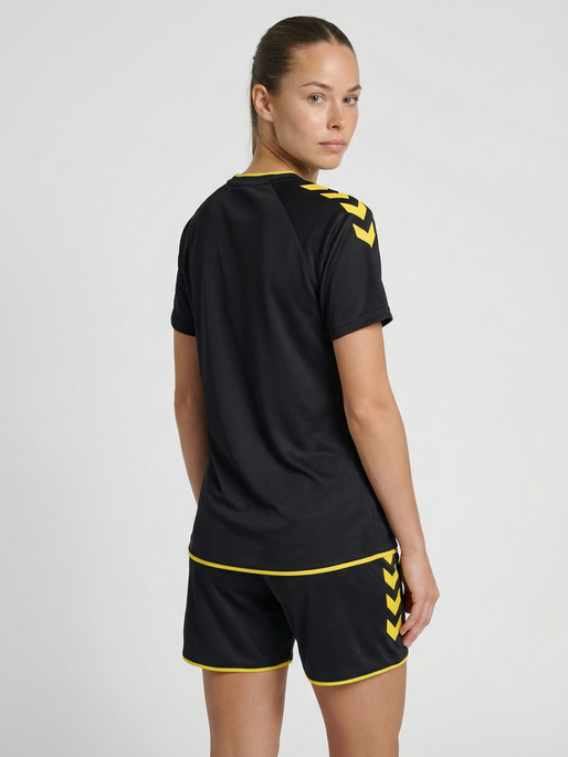 hmlCORE 2.0 JERSEY S/S WOMAN, BLACK/BLAZING YELLOW, model