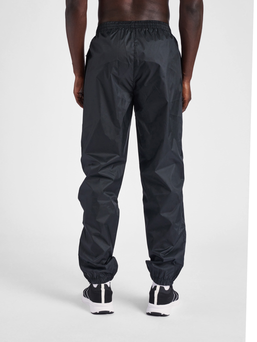 Lacoste guppy hotsell track pants black