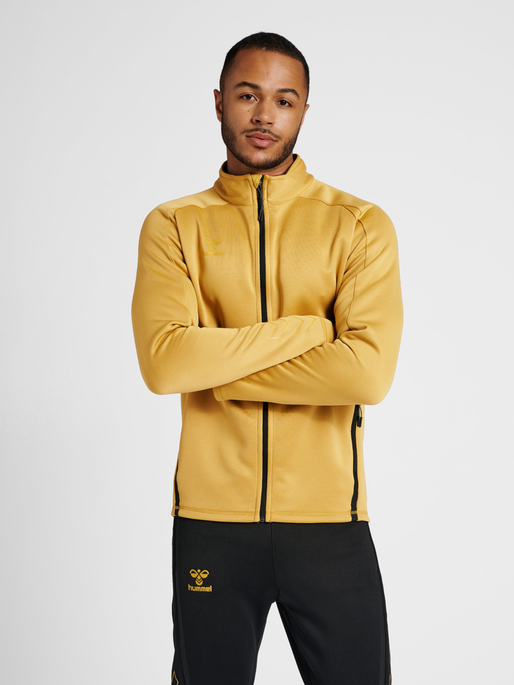 hummel XK ZIP - GOLD |