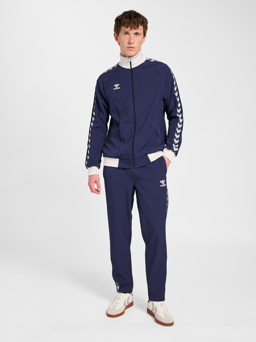hmlROOT TRACK PANTS, MARINE, model