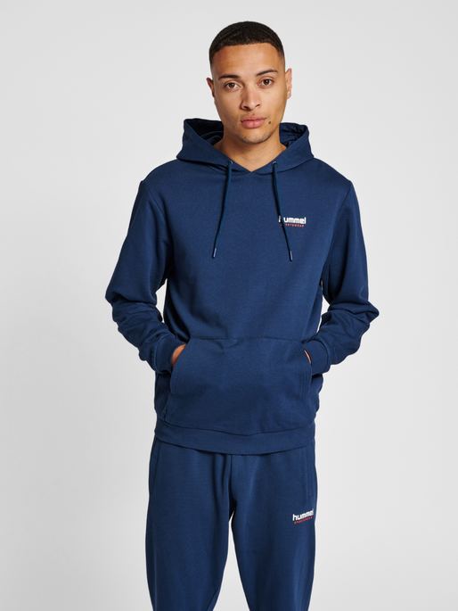 Guy wearing store a hoodie