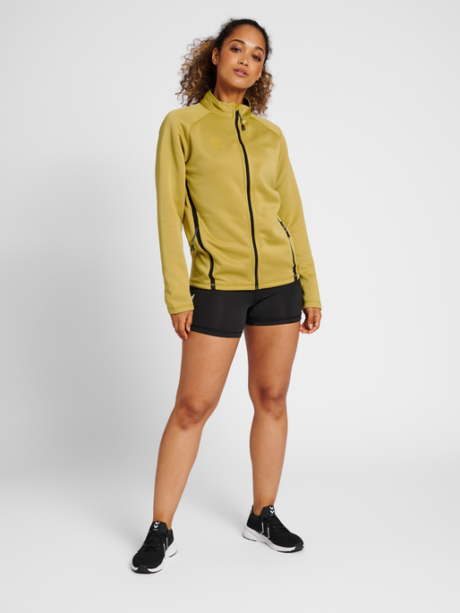 hmlCIMA XK ZIP JACKET WOMAN, ANTIQUE GOLD, model