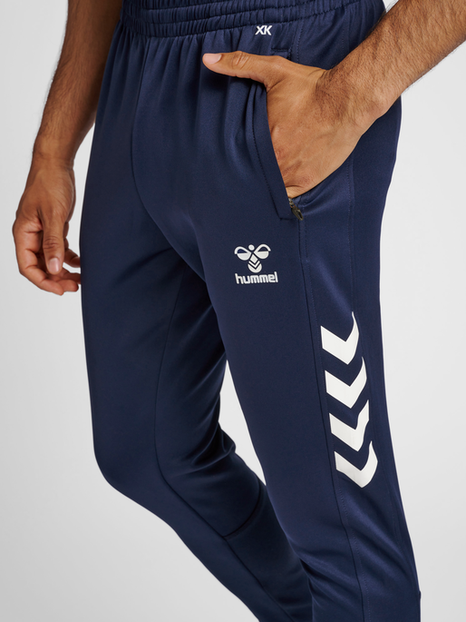 Hurtigt diskret Ledig hummel CORE XK TRAINING POLY PANTS - MARINE | hummel.net