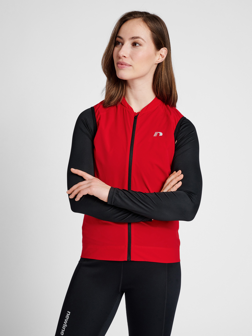 WOMENS CORE BIKE GILET, TANGO RED, model