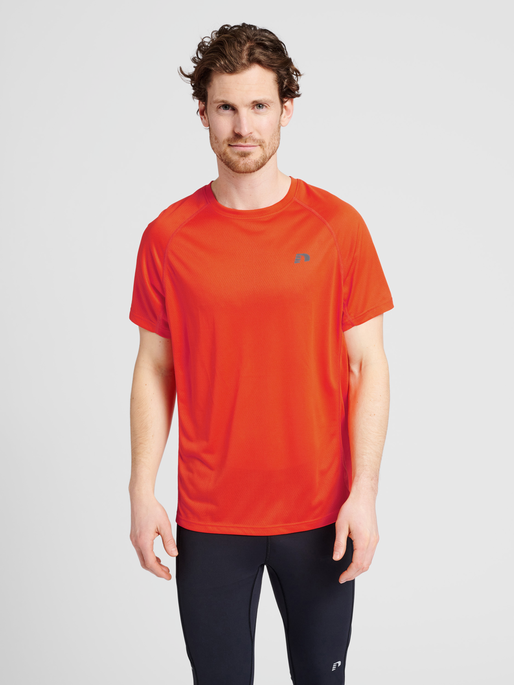 Orange running deals shirt
