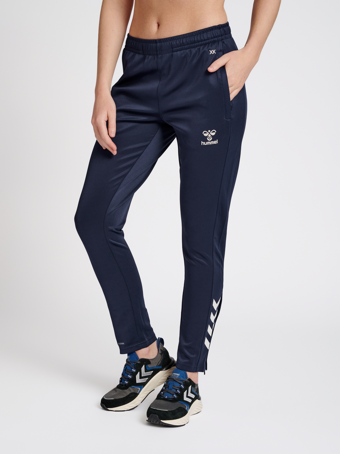 mundstykke flov specifikation hummel CORE XK POLY PANTS WOMAN - MARINE | hummel.net